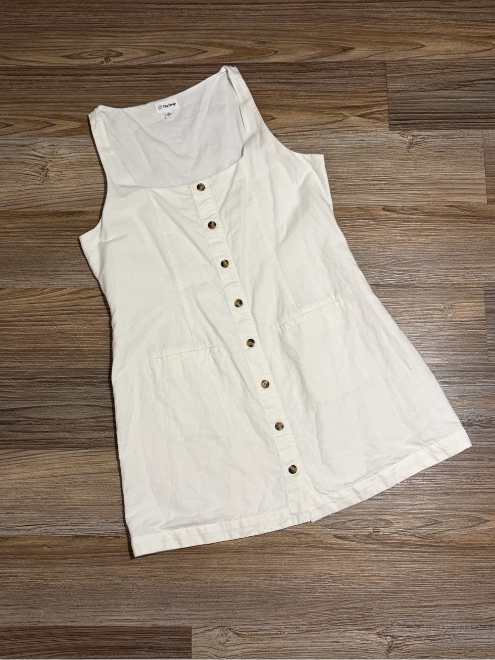 Sleeveless White Button-Front Mini Dress with Front Pockets